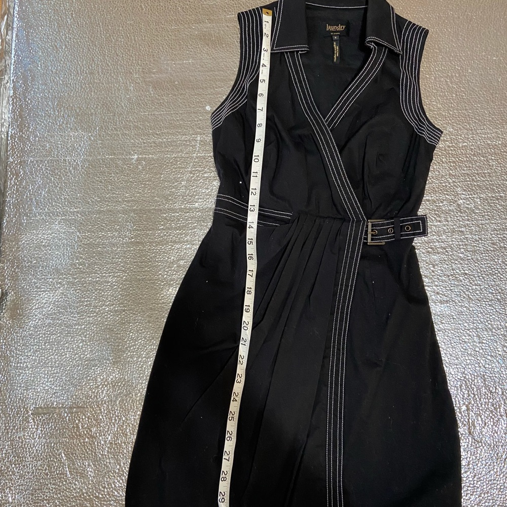 Sleeveless dress, navy blue with , very elegant looking dress.